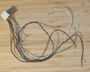 Plug and loose wires cut from loom