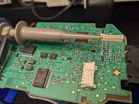 Oscilloscope probe wired to GWS PCB